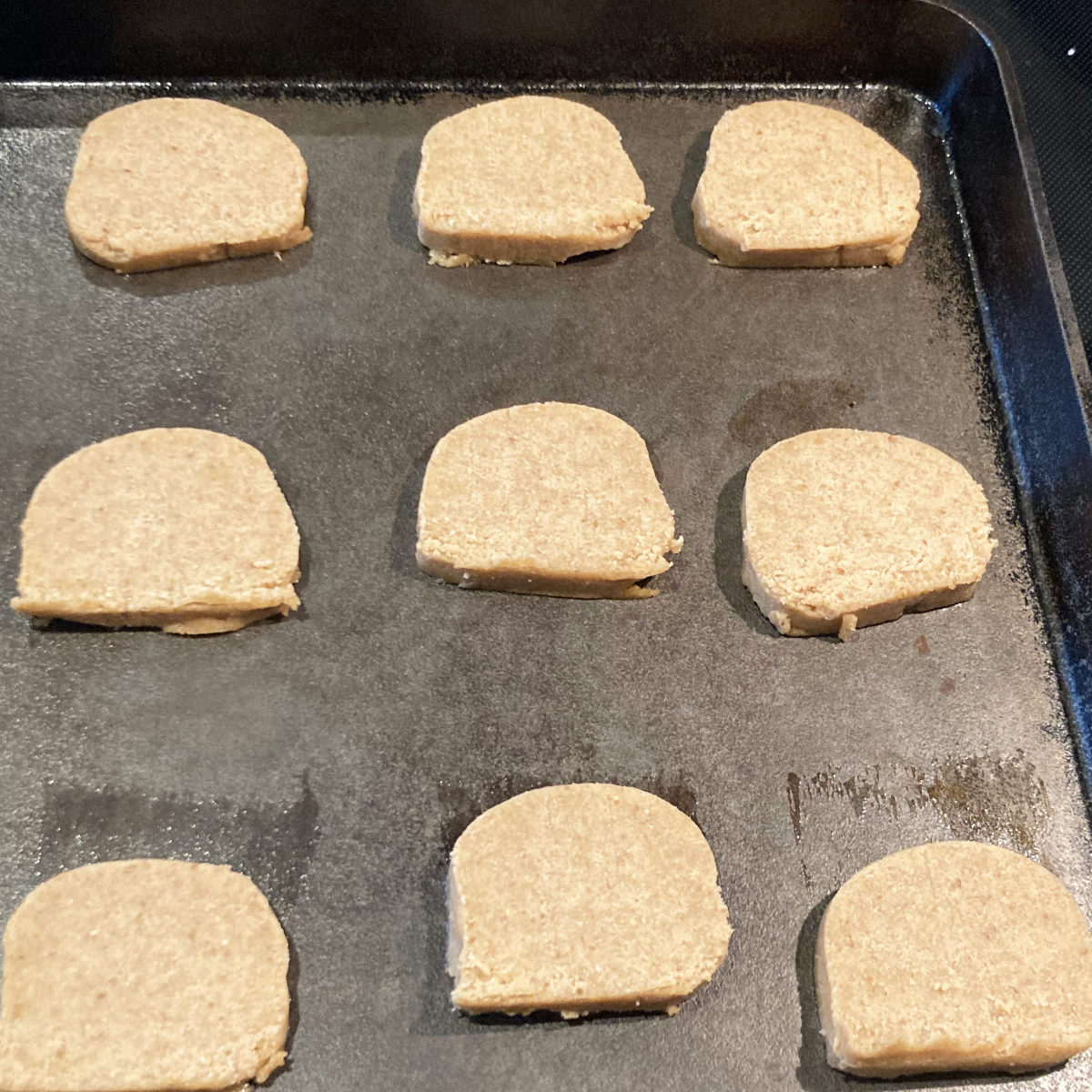 Easy shortbread cookies on a cast iron pan ready to bake