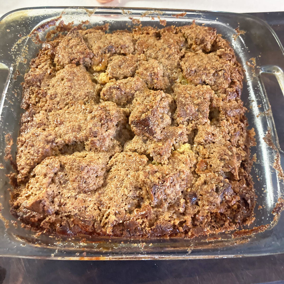 Homemade French toast bake casserole in an 8x8 glass pan
