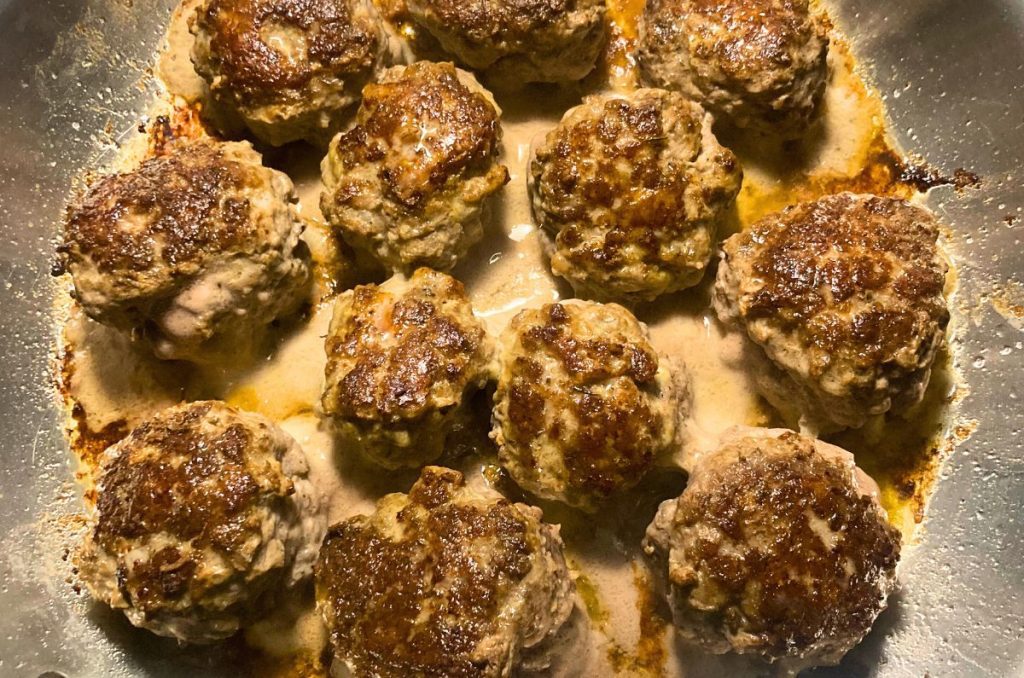 homemade meatball in a stainless steel pan made without meal planning