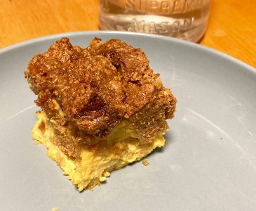 Piece of easy French toast bake casserole on a blue plate