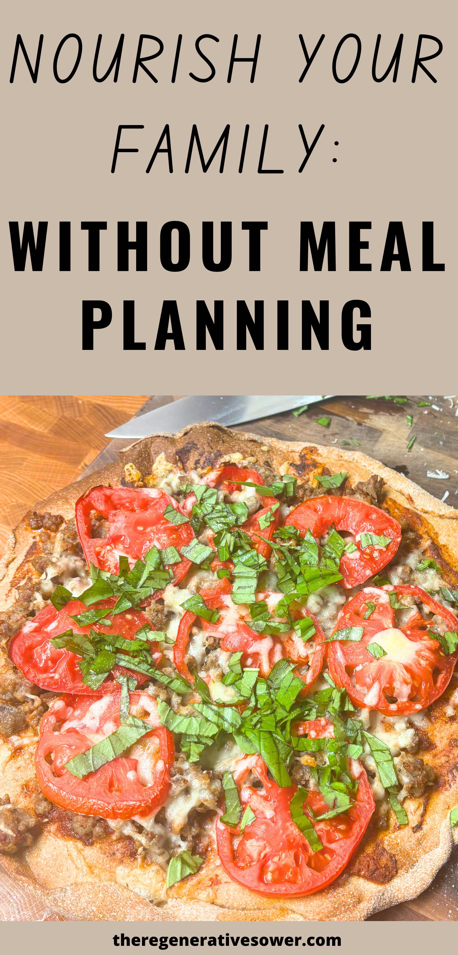 Homemade pizza with basil, tomatoes, sausage and cheese on a wooden cutting board with a knife with text nourish your family without meal planning