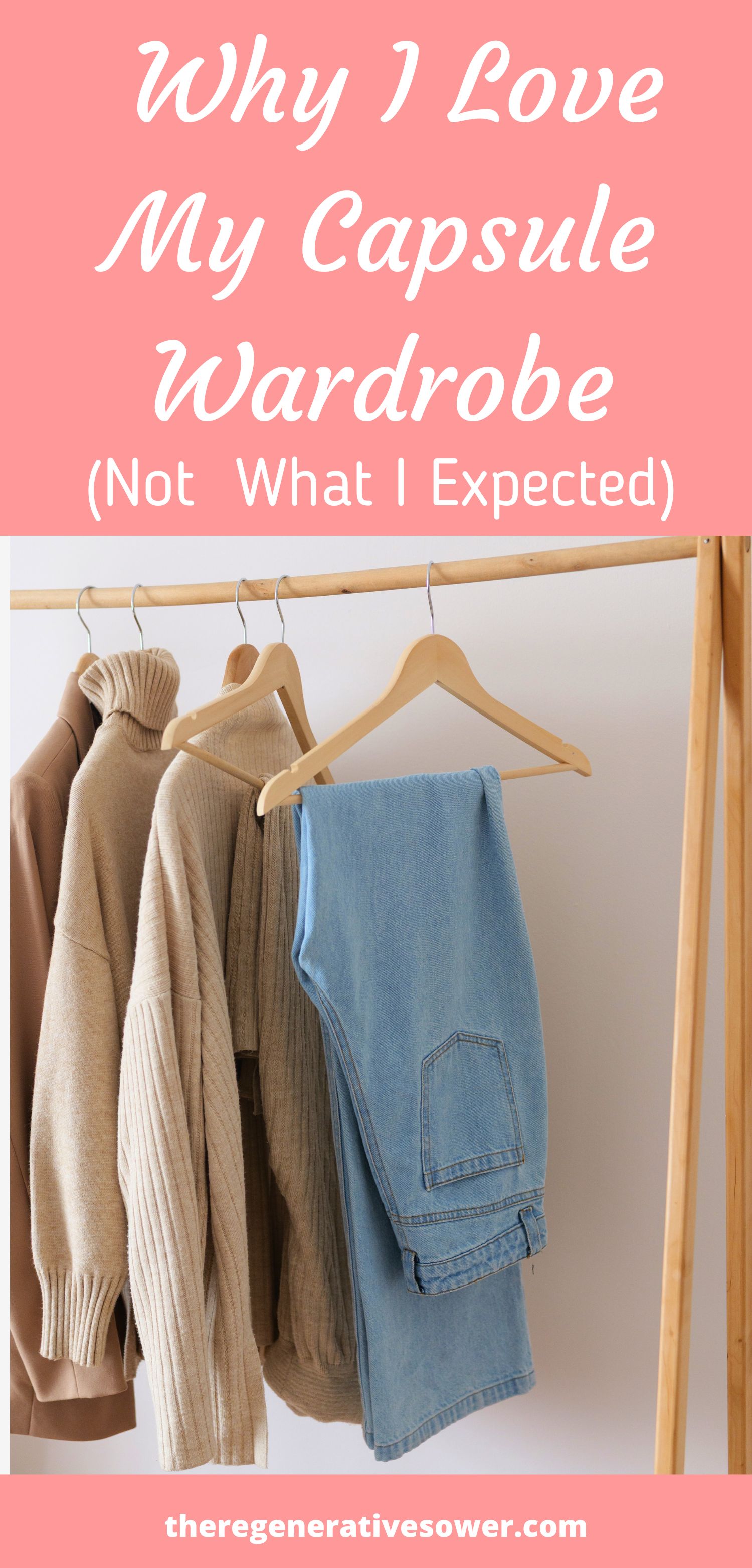 10 item capsule wardrobe or sweaters and a pair of jeans hanging on a wooden clothing rack